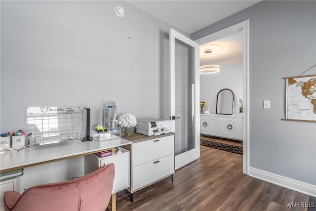 interior space with baseboards, dark wood-style floors, light countertops, french doors, and white cabinetry