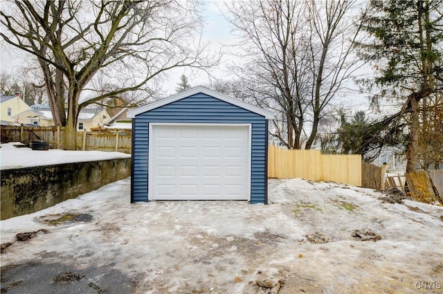 detached garage with fence