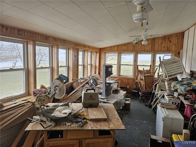 sunroom / solarium featuring vaulted ceiling