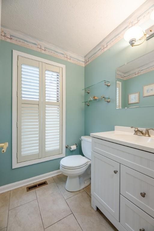 bathroom featuring tile patterned flooring, visible vents, a textured ceiling, and toilet