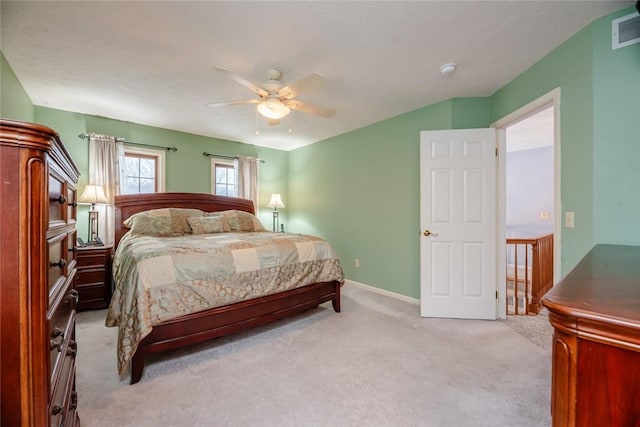 bedroom with carpet, visible vents, ceiling fan, and baseboards