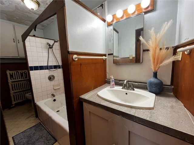 bathroom with tub / shower combination and vanity