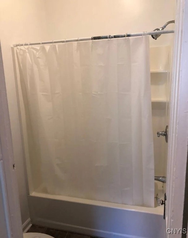 full bath featuring shower / bath combination with curtain