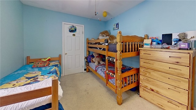 bedroom with light carpet