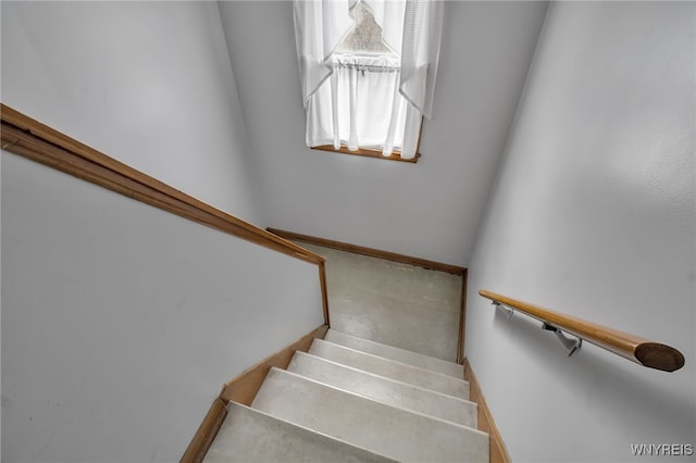 staircase with baseboards