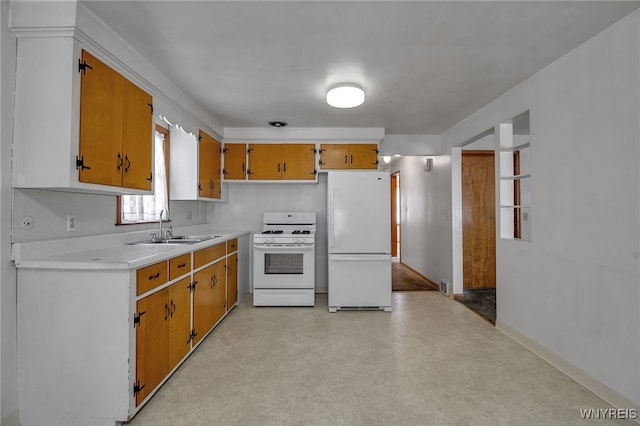 kitchen with white appliances, a sink, finished concrete flooring, light countertops, and brown cabinetry