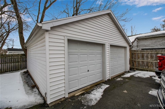 detached garage with fence