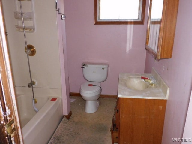 325 Ontario St, Lockport-City, NY 14094 - bathroom with toilet, baseboards, and vanity