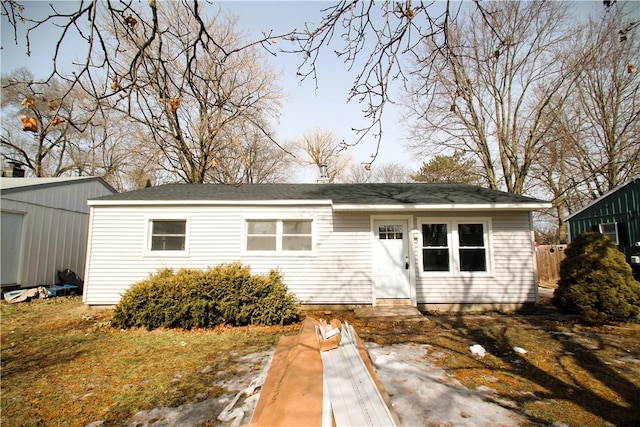 view of front of home with an outdoor structure