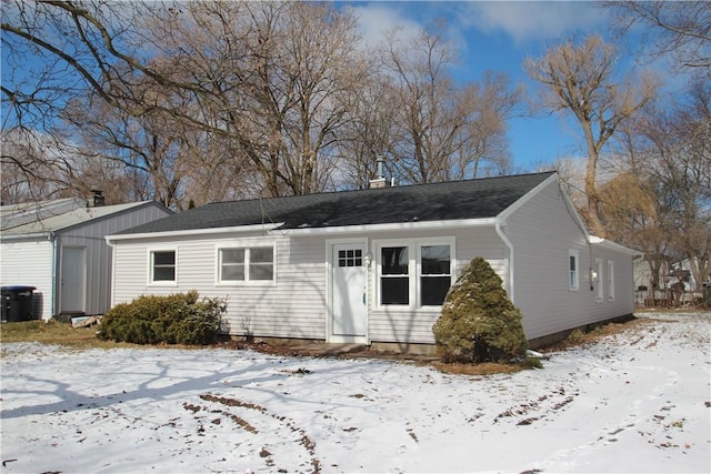 ranch-style house with a chimney