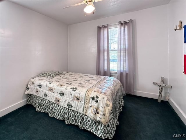 bedroom featuring ceiling fan, carpet flooring, and baseboards