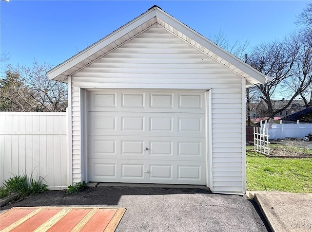 detached garage with fence