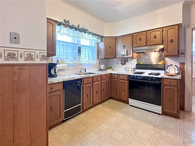 kitchen featuring under cabinet range hood, a sink, black dishwasher, light countertops, and gas stove