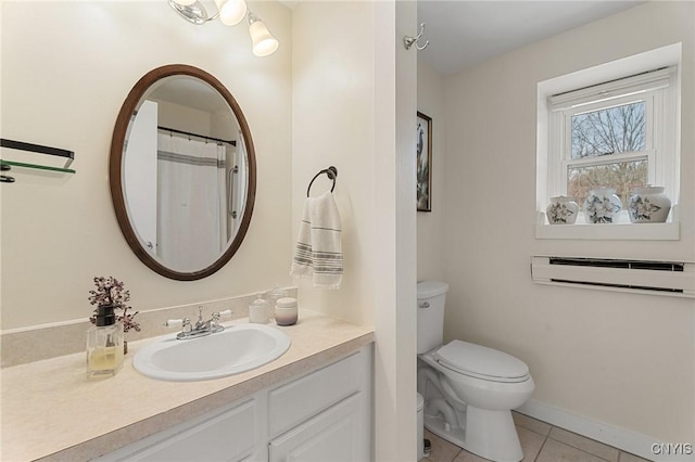 full bathroom featuring tile patterned flooring, toilet, vanity, baseboards, and an AC wall unit