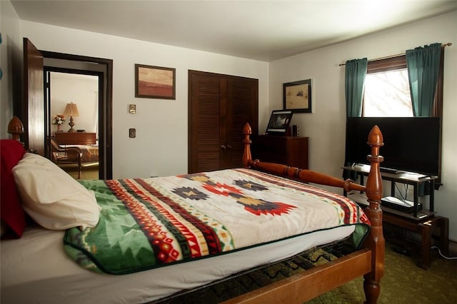 carpeted bedroom featuring a closet