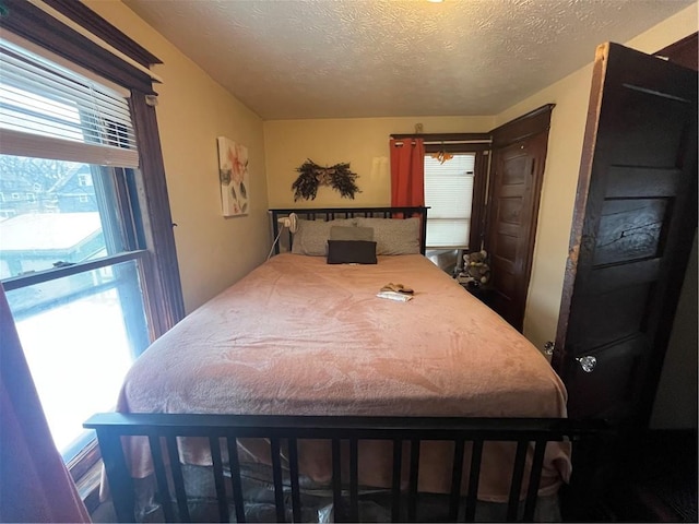 bedroom featuring a textured ceiling