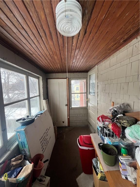 interior space featuring plenty of natural light and wood ceiling