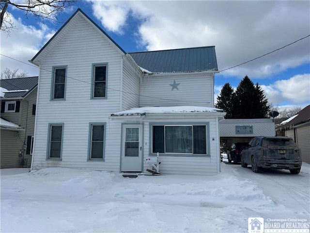507 E Connell St, Olean-City, NY 14760 - snow covered rear of property featuring metal roof