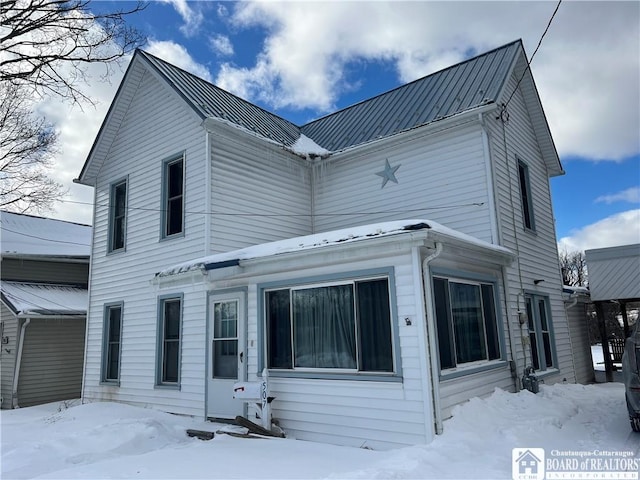 view of front of property with metal roof