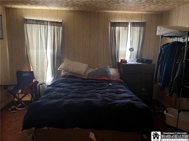 507 E Connell St, Olean-City, NY 14760 - bedroom featuring wood walls, carpet flooring, and an ornate ceiling