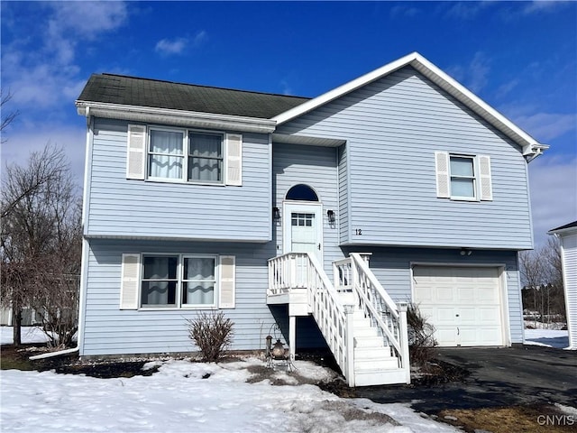 split foyer home featuring an attached garage