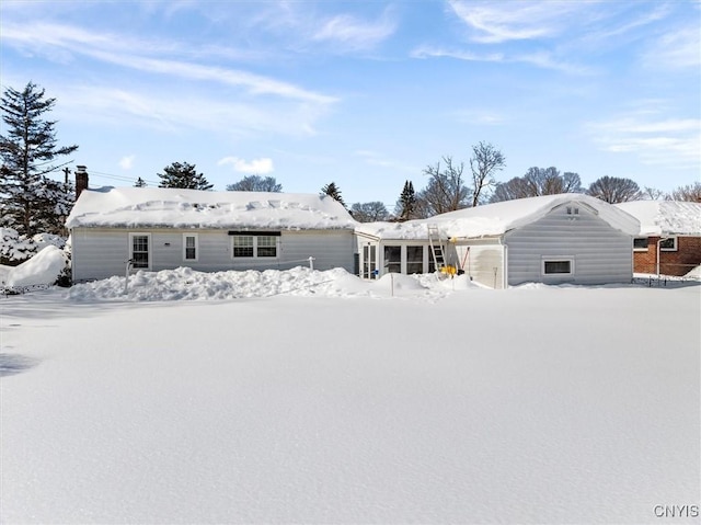 view of snow covered property