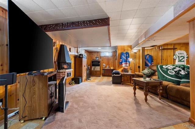 interior space featuring carpet flooring and wooden walls