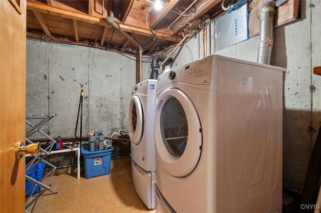 clothes washing area with laundry area and separate washer and dryer