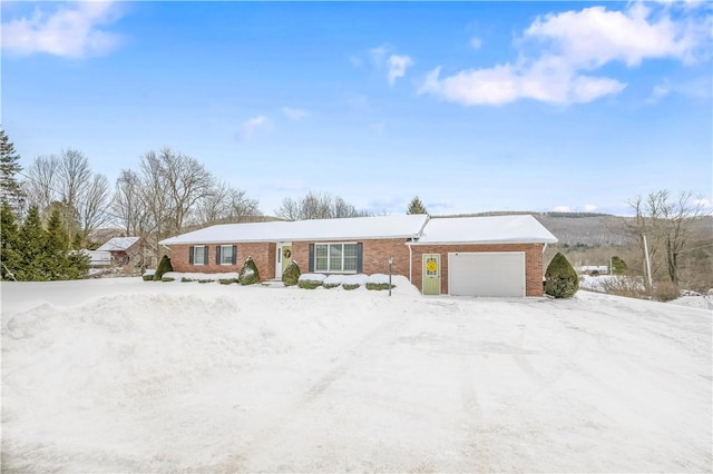284 Main St, Worcester, NY 12197 - ranch-style home featuring a garage and brick siding