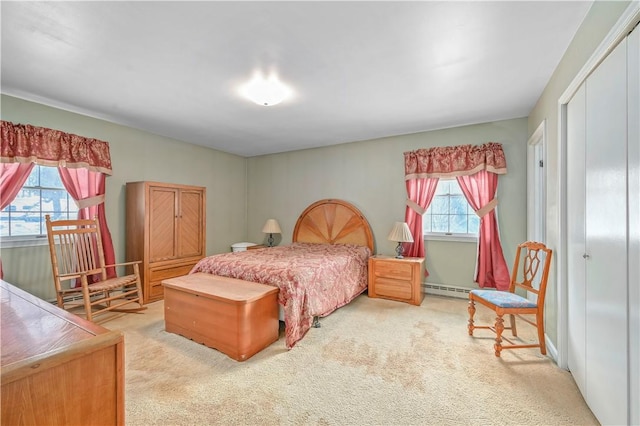 284 Main St, Worcester, NY 12197 - carpeted bedroom featuring a baseboard radiator and a closet