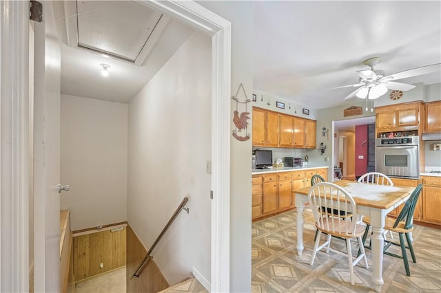 284 Main St, Worcester, NY 12197 - kitchen with ceiling fan, stainless steel oven, and light countertops