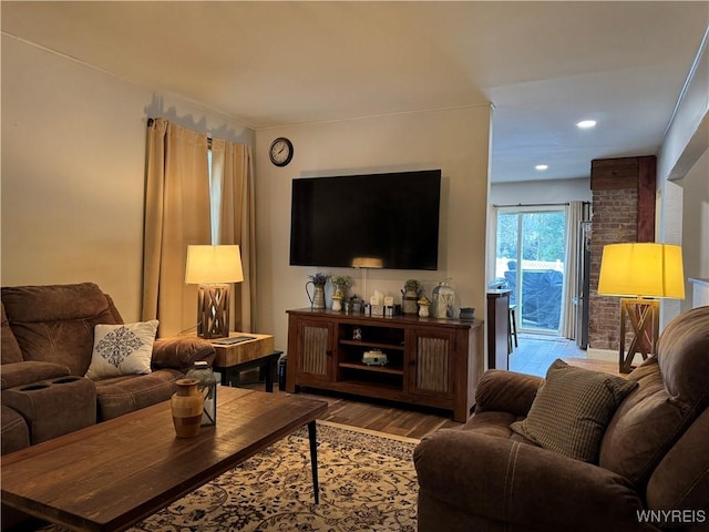 living area featuring recessed lighting and wood finished floors