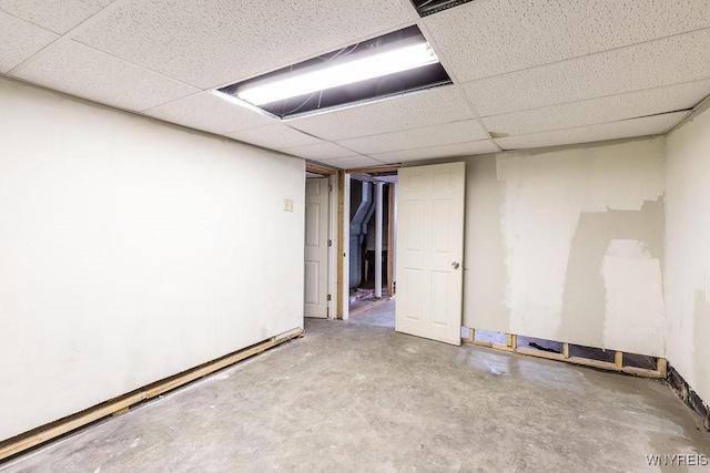 finished basement with a drop ceiling