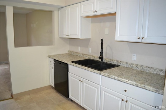 kitchen with baseboards, white cabinetry, dishwasher, and a sink