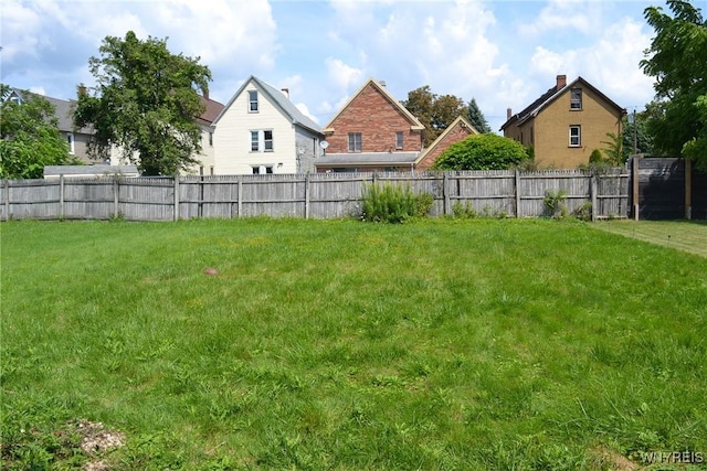 view of yard with fence