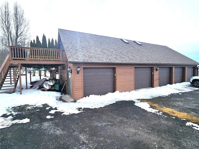 view of snow covered garage