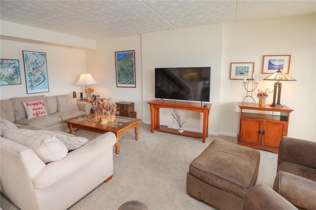 living room featuring light colored carpet and baseboards