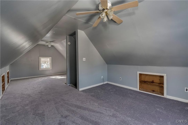 bonus room with vaulted ceiling, ceiling fan, carpet, and baseboards