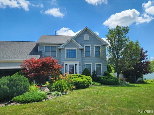 view of front facade with a front lawn