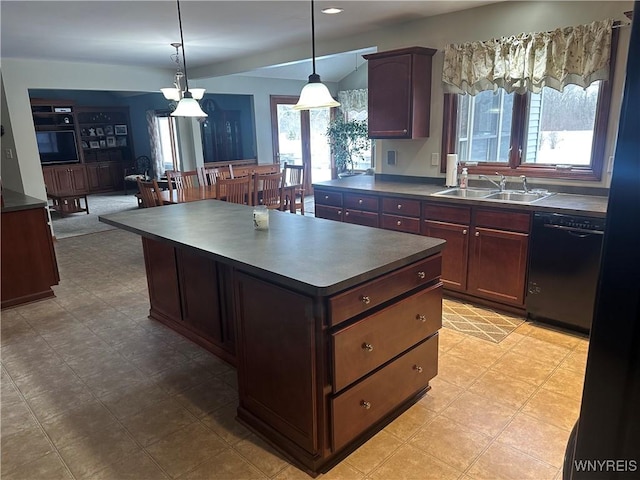 kitchen with black dishwasher, dark countertops, hanging light fixtures, a kitchen island, and a sink