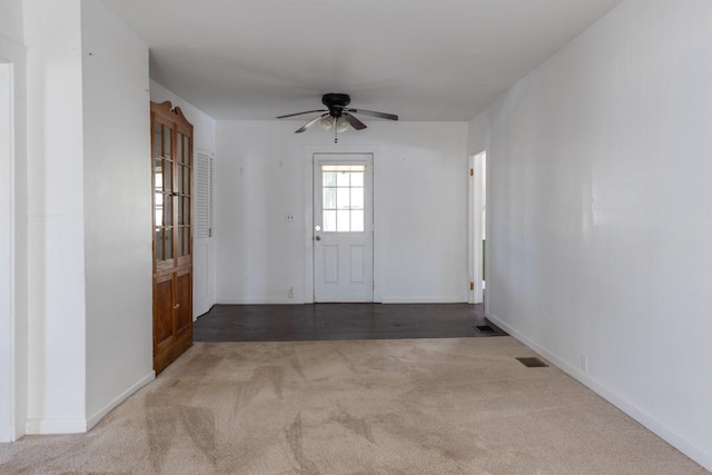 903 W 1st St, Elmira, NY 14905 - carpeted foyer featuring ceiling fan and baseboards