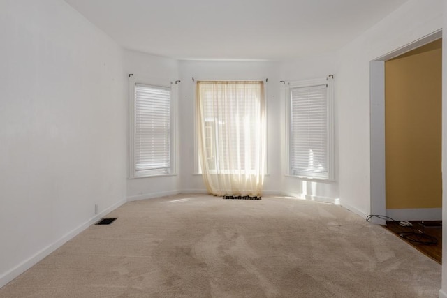 903 W 1st St, Elmira, NY 14905 - carpeted empty room featuring baseboards