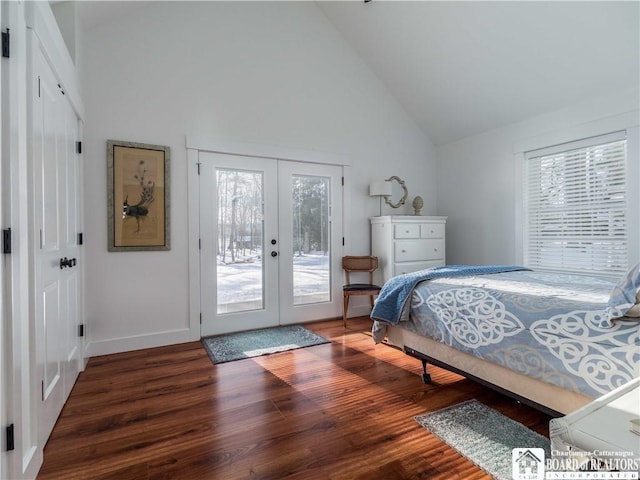 bedroom with access to exterior, french doors, wood finished floors, high vaulted ceiling, and baseboards