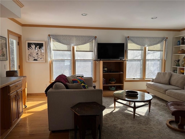 living area with recessed lighting, baseboards, crown molding, and wood finished floors