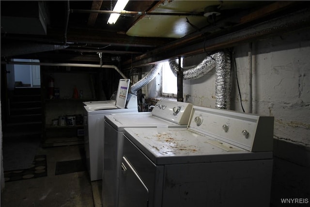 clothes washing area featuring laundry area and independent washer and dryer