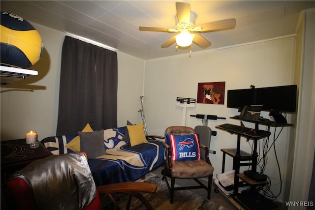 living room with a ceiling fan