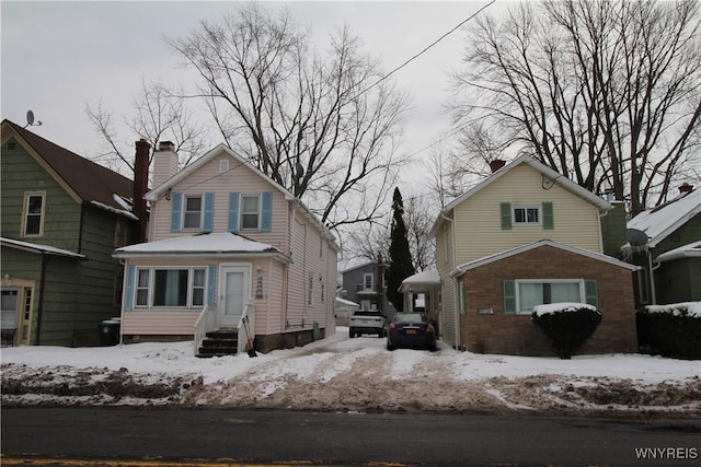 view of front of home with entry steps