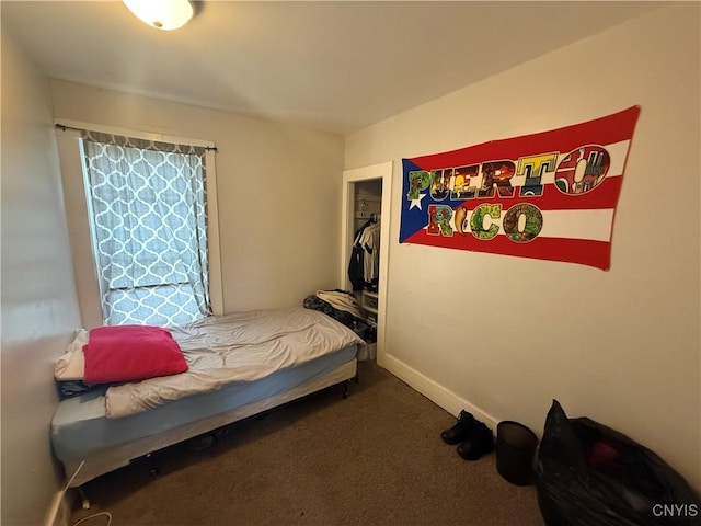 carpeted bedroom with baseboards