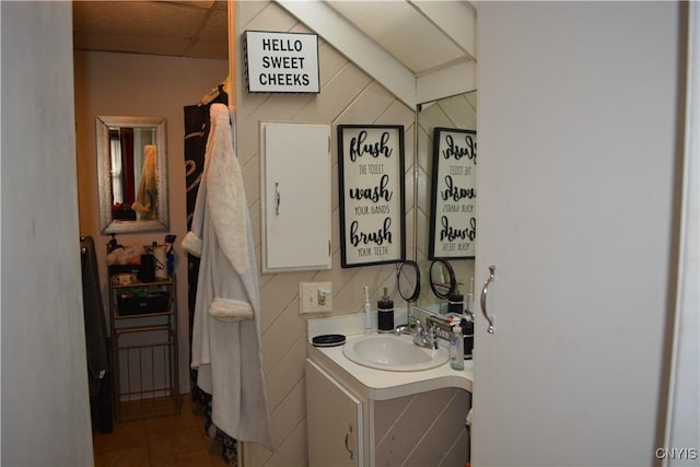 bathroom featuring vanity and a paneled ceiling