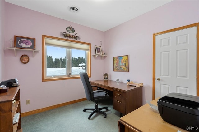 carpeted office space featuring baseboards and visible vents